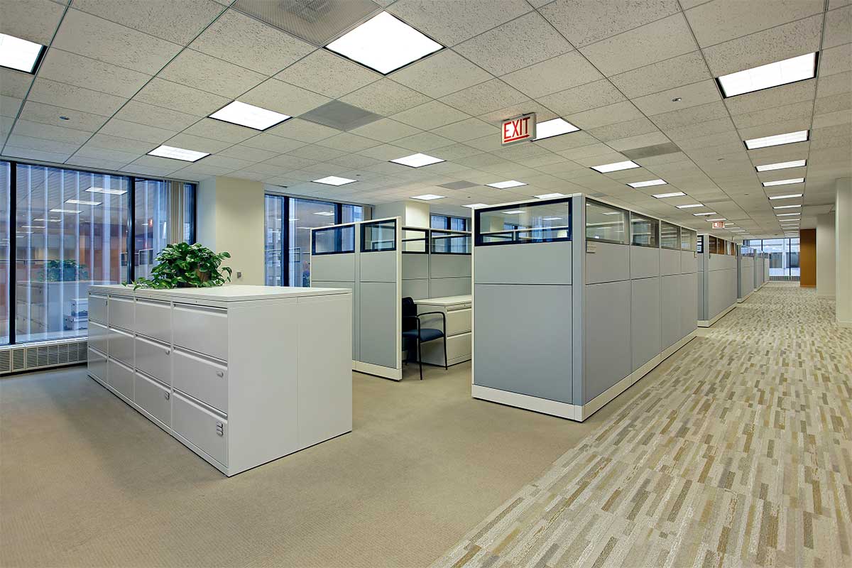 Office area with cubicles in high rise building